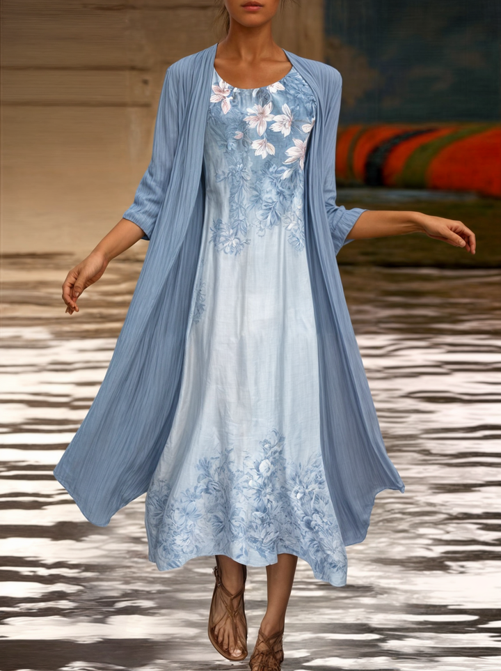 Knee-length woman dress with flower pressure and matc perhaps cardigan