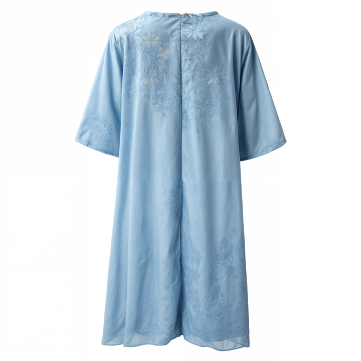Knee-length woman dress with flower pressure and matc perhaps cardigan